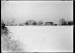 View Of House And Barn Across A Snow Covered Field by George French