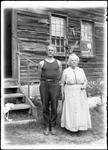 G. French And His Mother Standing Outside A House by George French