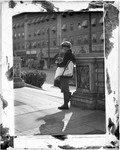 Newsboy On Jersey Street Counting His Money by George French