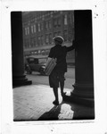 Newsboy Selling Papers, Leans Against A Column On A City Sidewalk, New Jersey by George French