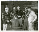 Inspecting a Fly-fishing Rod by Maine Department of Economic Development