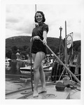 Rockland Seafood Festival, 1958 - Woman on Boat Holding Rope by Maine Department of Sea and Shore Fisheries
