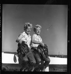 Rockland Seafood Festival, 1958 - Twins with Lobsters by Maine Department of Sea and Shore Fisheries