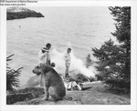 Lobster Bake - Family on Shore, Dog in Foreground by Maine Department of Marine Resouces