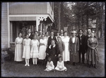 Empire Grove 02: Group of 20 People in beside a Cottage, East Poland, ca. 1911 by Mary Irish