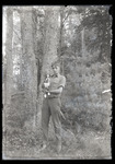 Empire Grove 09: Young Man with Puppy, East Poland, ca. 1911