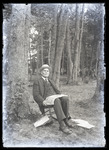 Empire Grove 18: Gentlemen sitting by Woods Holding a Newspaper, East Poland, ca. 1911