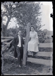 Empire Grove 26: Man and Woman Posing with Fence, East Poland, ca. 1911 by Mary Irish