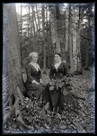 Empire Grove 29: Two Women Sitting in the Woods, East Poland, ca. 1911 by Mary Irish