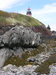 West Quoddy Light with rocks by Joseph Kelley