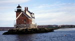 lighthouse at end of Rockland jetty by Joseph Kelley