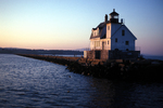 Rockland jetty and lighthouse sunset by Joseph Kelley