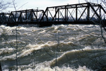 Stillwater flood under railroad trestle