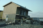 Storm damage to coastal house