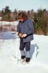 Craig Neil measuring water levels in the winter