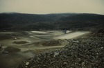 Restigouche Mine view from acid-generating waste pile. Leachate collection pond and treatment facility - New Brunswick