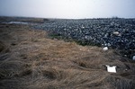 Crescent Beach Kittery - photo (5) - Gravel overwash into lagoon/marsh. 50 cm scale + notebook.