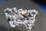Hydroxylherderite (70 x 45 mm) - Bennett Q. - Largest crystal 13mm