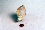 Herderite Crystals on Tip of Quartz