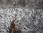 Pegmatite against granite.