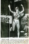 Newspaper clipping - 1993 - Donna Sund crossing line at Hawaii's triathlon