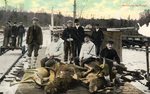 Postcard - Hunters and deer at railroad station