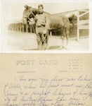Alfred H. Washburn Next to a Horse